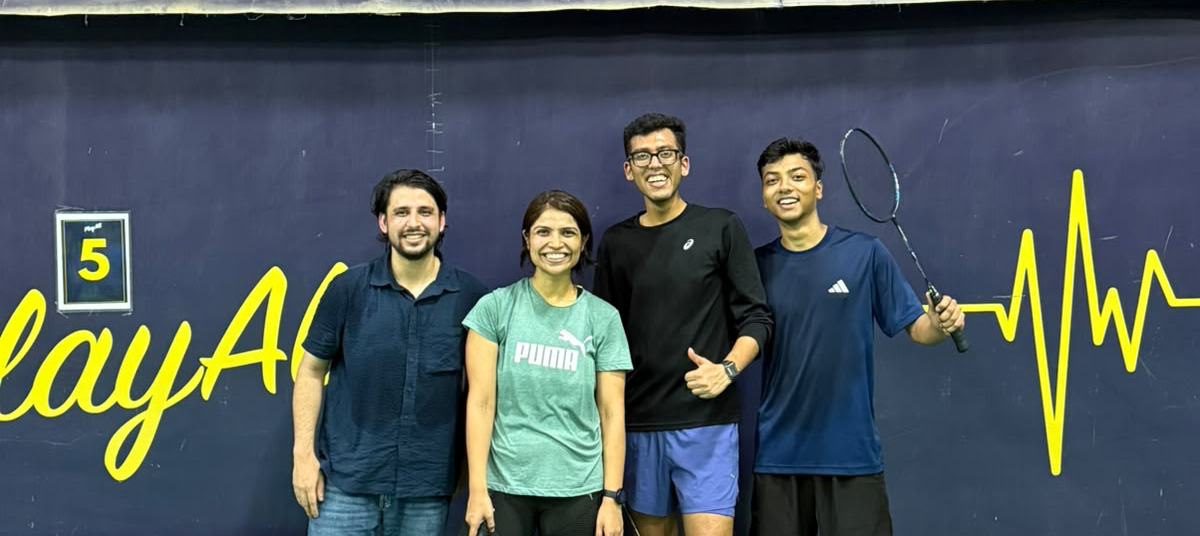 DSC Season 1 badminton champions with their rackets